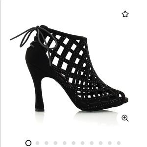 Black crystal studded dance shoes.